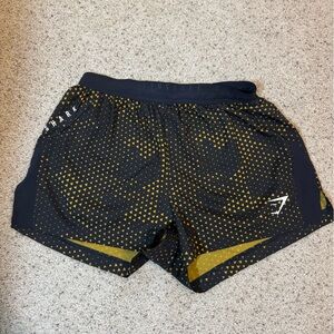 Black and Gold Gymshark Patterned Shorts
